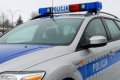 Zdjęcie przedstawiające oznakowany radiowóz