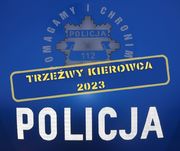 Zdjęcie przedstawia granatowy plakat na środku którego widnieje napis: &quot;Trzeźwy kierowca 2023&quot;.