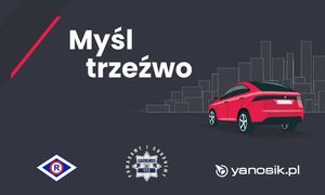 Zdjęcie przedstawi ciemny plakat na którym widać rysunek czerwonego samochodu i biały napis &quot;Myśl trzeźwo&quot;.