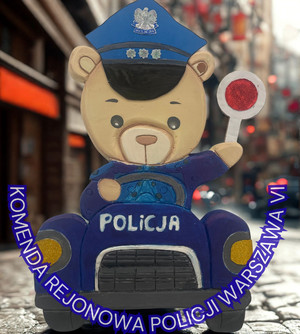 Zdjęcie przedstawia niebieskiego misia - pracę plastyczną.